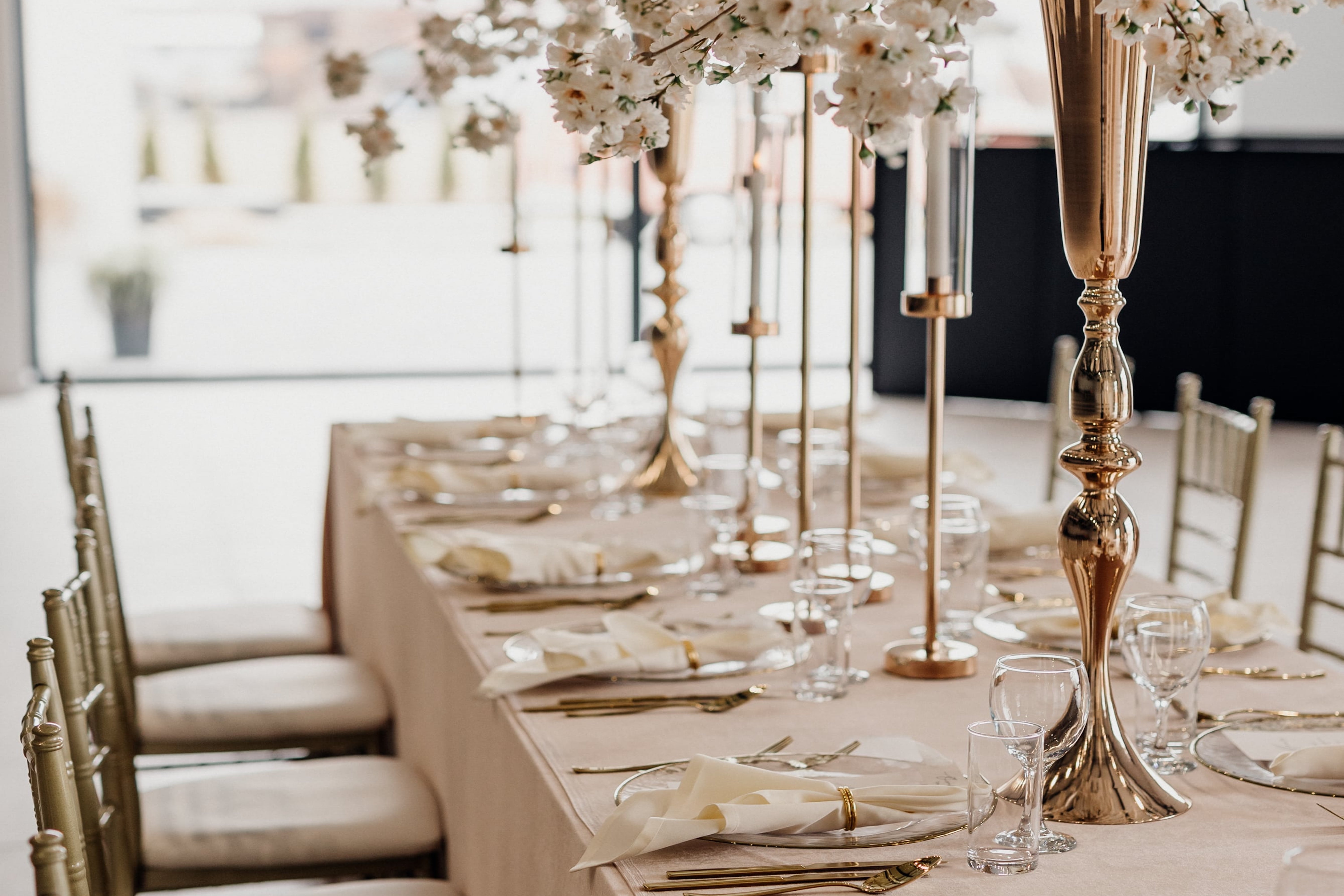 A table with wedding decorations 
